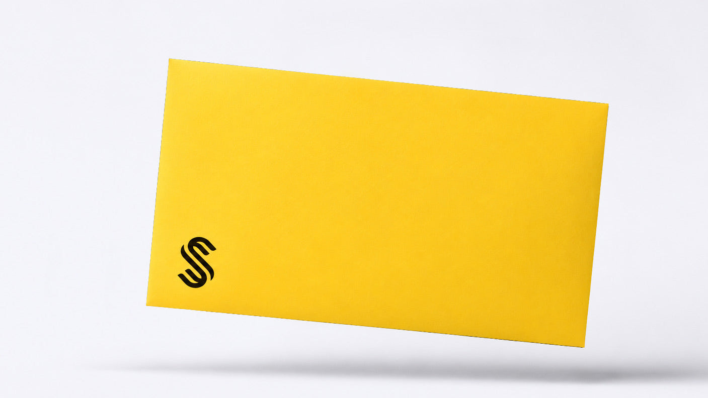 Yellow card with a black logo on a white background